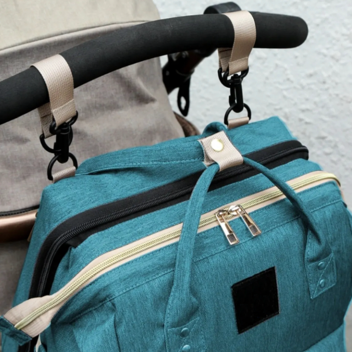 Nuvella Baby – Alltid forberedt – Multifunksjonell bleieveske med seng