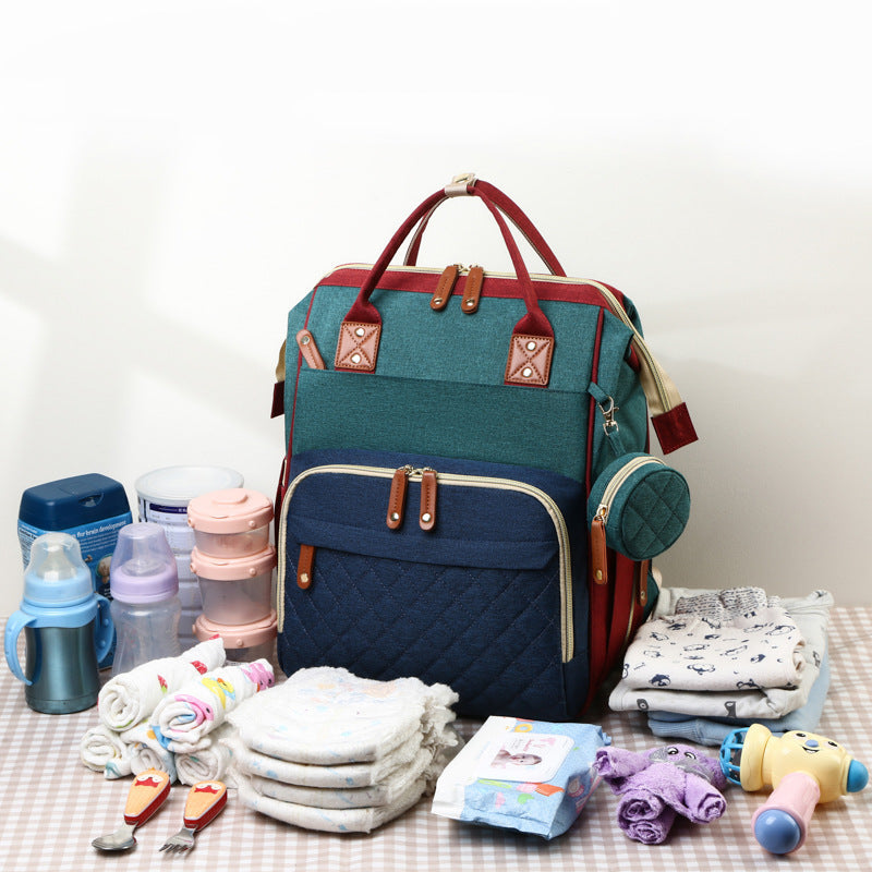 TravelNest – Alltid et hvilested – 2-i-1 bleieveske med babyseng
