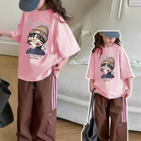 Thumbnail for CuteStyle – Trendy og komfortabel – T-skjorte med oversized tegneserieprint