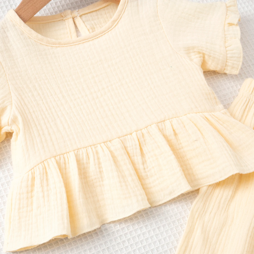 SoftCharm – Elegant og komfortabelt – Jentesett med topp med volanger og lange bukser