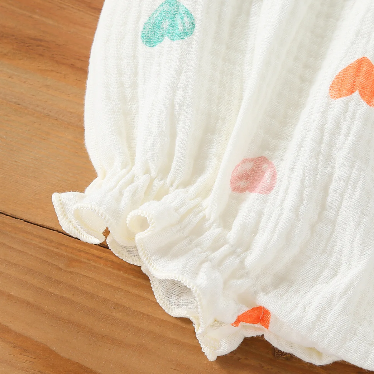 LittleBlossom – Sommerlig komfort og stil – Bodysuit med hette til baby