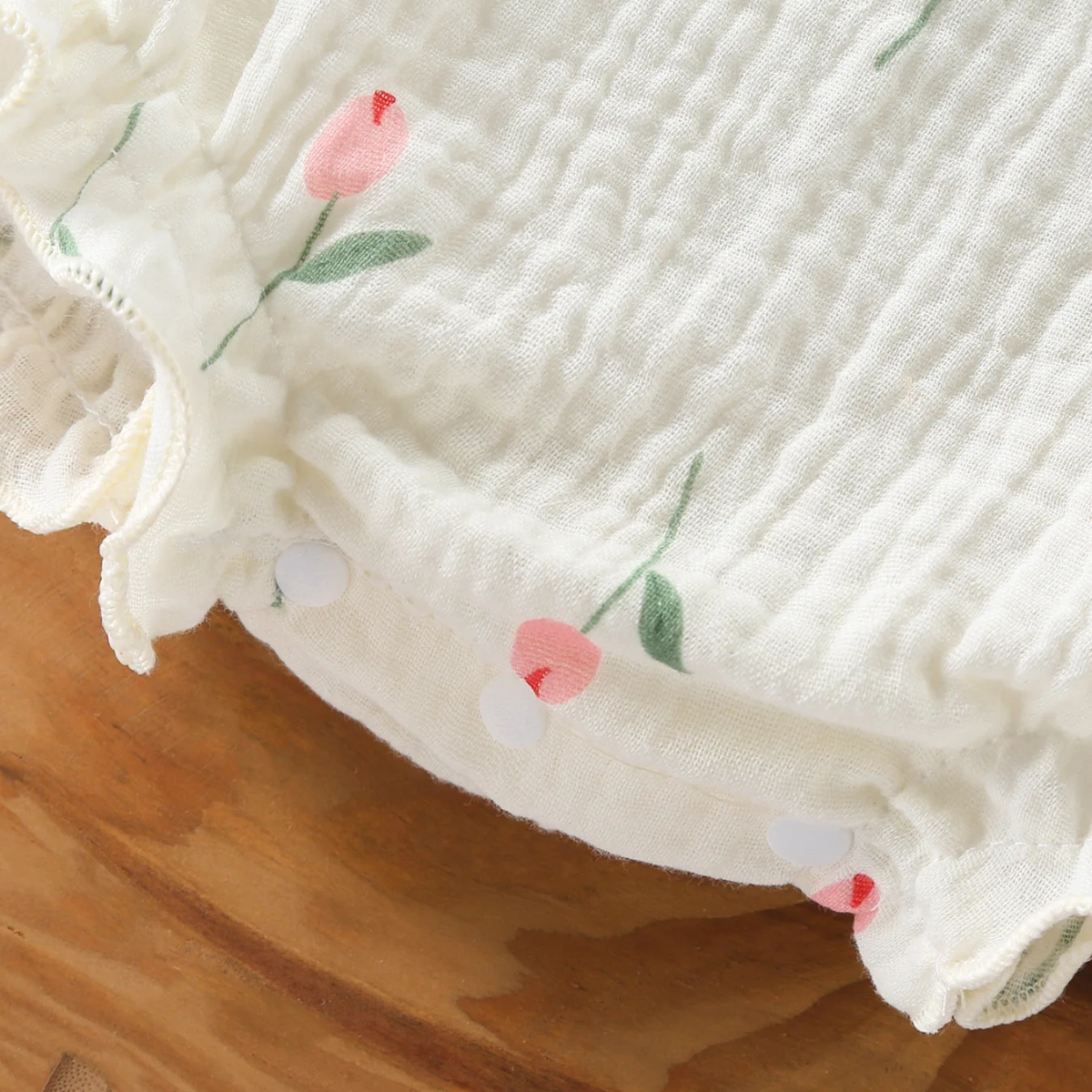 LittleBlossom – Sommerlig komfort og stil – Bodysuit med hette til baby
